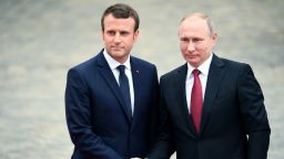 Russian President Vladimir Putin (R) is welcomed by French President Emmanuel Macron (L) as they shake hands at the Versailles Palace, near Paris, on May 29, 2017, ahead of their meeting.
French President Emmanuel Macron hosts Russian counterpart Vladimir Putin in their first meeting since he came to office with differences on Ukraine and Syria clearly visible. / AFP PHOTO / CHRISTOPHE ARCHAMBAULT        (Photo credit should read CHRISTOPHE ARCHAMBAULT/AFP/Getty Images)