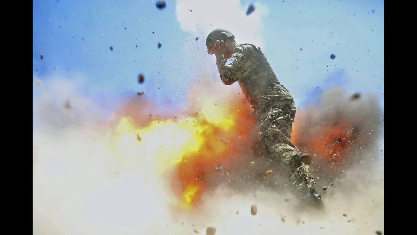 In this photo -- <a href="http://www.cnn.com/2017/05/03/us/moment-of-explosion-trnd/" target="_blank">published this month</a> by Military Review, the US Army's professional journal -- a mortar tube explodes near an Afghan soldier during a training exercise in July 2013. The photo was taken by US Army Spc. Hilda Clayton, a combat photographer who was killed in the accident along with three Afghan soldiers and the Afghan photographer she was training. Clayton's family approved the release of the photo, <a href="https://www.stripes.com/news/army-releases-images-of-combat-photographer-s-final-moments-before-fatal-blast-1.466230#.WQua-LvyvJy" target="_blank" target="_blank">according to the Stars and Stripes newspaper,</a> and the Military Review featured it as part of its issue on gender equality.