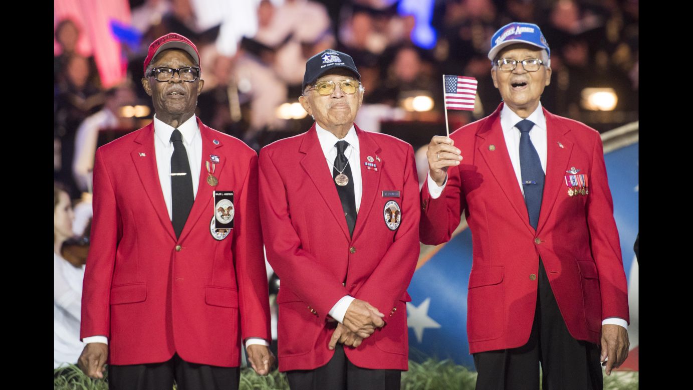 <a href="http://www.cnn.com/2015/01/12/us/feat-tuskegee-airmen-obit/" target="_blank">Tuskegee Airmen</a> walk on stage during the National Memorial Day concert in Washington on Sunday, May 28.