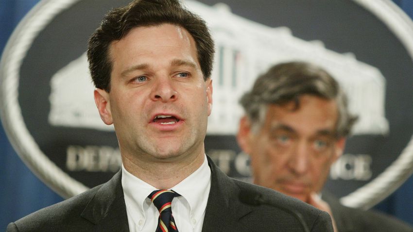 Assistant Attorney General Christopher Wray, left, announces at the Justice Department in Washington Tuesday, Nov. 4, 2003 that former HealthSouth Corp. head Richard Scrushy was indicted on 85 counts alleging he was the mastermind of an enormous corporate fraud scheme that allowed him to personally pocket more than a quarter-billion dollars. Josh Hochberg, chief of the Justice Department's Fraud Section is at right. (AP Photo/Ron Edmonds)
