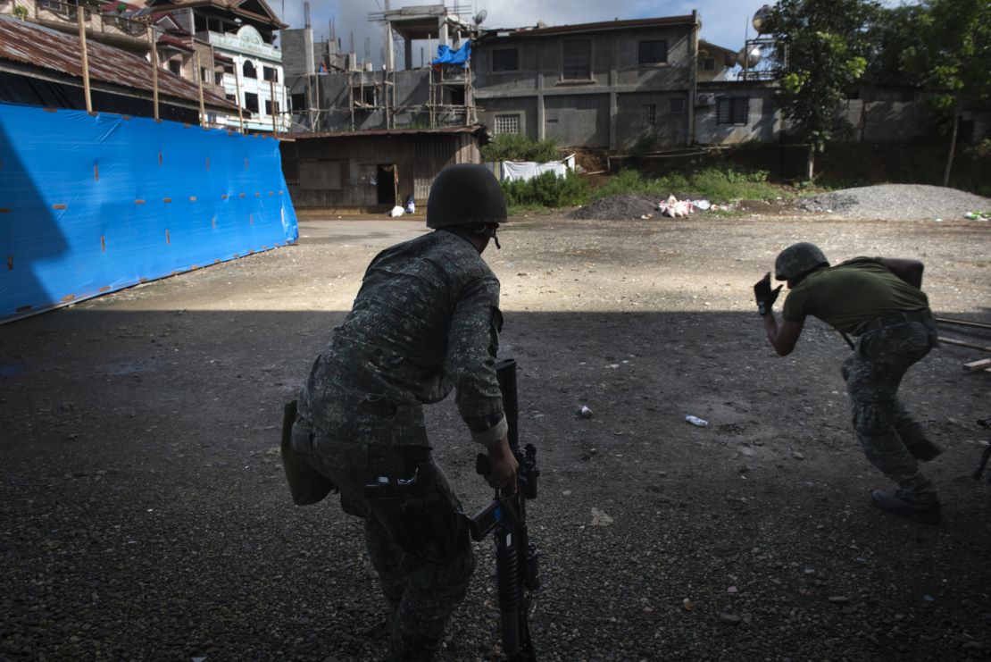 Filipino soldiers engage in a firefight with ISIS-linked militants on May 30, 2017, in Marawi in the southern Philippines.