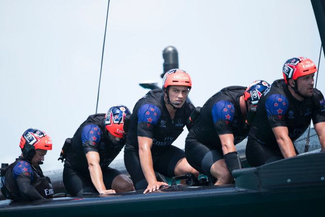 Emirates Team New Zealand work their pedal powered race yacht.