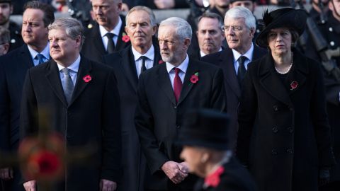 Corbyn stands next to British Prime Minister Theresa May at the annual Remembrance Sunday Service in London last year. 