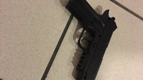 "This is the gun the suspect was carrying and threatening officers with," the Orlando Police Department said. The weapon later turned out to be fake, police said. 