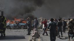 Afghan security forces personnel are seen at the site of a car bomb attack in Kabul on May 31.