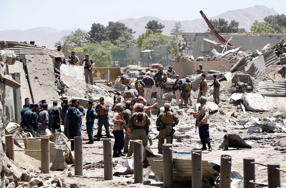 German and Afghan authorities inspect the scene of the blast. German Foreign Minister Sigmar Gabriel said the attack was in the "immediate vicinity" of the nation's embassy. "In the attack, officials of the German Embassy were also injured. In the meantime, all employees are safe," Gabriel said.