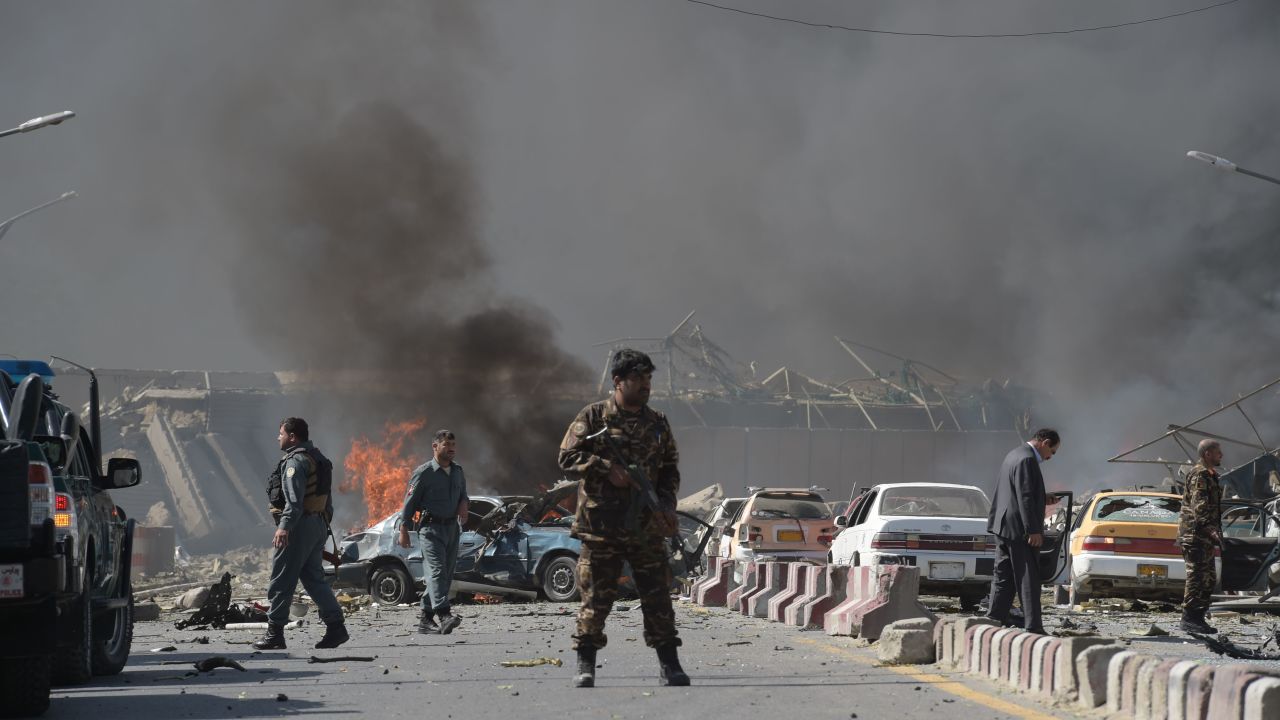 An Afghan security force member stands at the site of a car bomb attack in Kabul on May 31, 2017.
At least 40 people were killed or wounded on May 31 as a massive blast ripped through Kabul's diplomatic quarter, shattering the morning rush hour and bringing carnage to the streets of the Afghan capital. / AFP PHOTO / SHAH MARAI        (Photo credit should read SHAH MARAI/AFP/Getty Images)