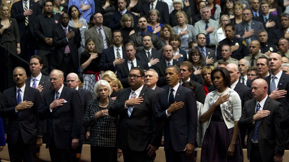 Kennedy joins the President and other officials at a memorial for the victims of a shooting in Tucson, Arizona, in 2011.