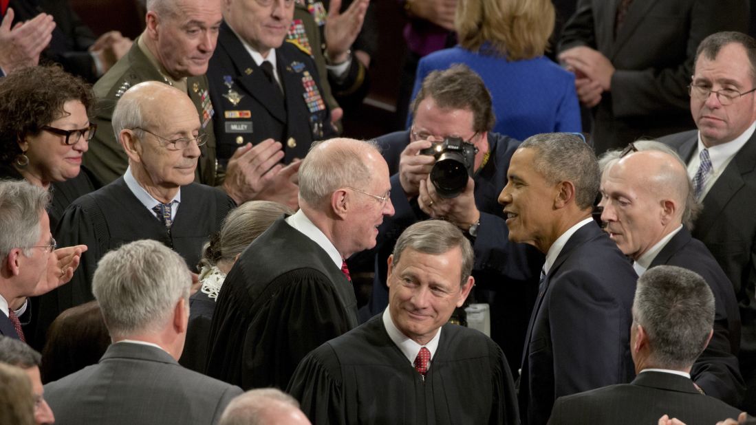 President Obama greets Kennedy and other Supreme Court justices before his final State of the Union address in January 2016.
