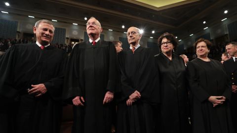 Kennedy, second from left, joins other Supreme Court justices in February 2017 during President Donald Trump's first address to a joint session of Congress.
