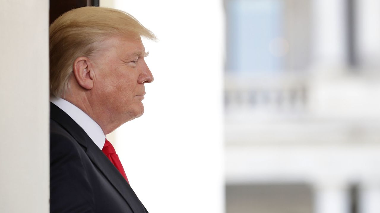 U.S. President Donald Trump watches as Vietnamese Prime Minister Nguyen Xuan Phuc leaves the White House following meetings May 31, 2017 in Washington, DC. According to Phuc, the U.S. and Vietnam are working on new trade agreements after the Trump Administration withdrew from the Trans-Pacific Partnership.