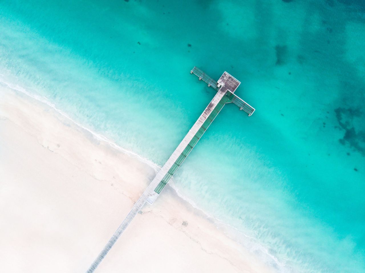 <strong>Turquoise Jetty:</strong> "The composition, color, detail and tone of this image are all so mesmerizing," said judges of this finalist, taken by photographer <a href="https://www.skypixel.com/user/brandond" target="_blank" target="_blank">Brandon Davies</a>. "The competition had a lot of top down shots over jetties and the ocean but this one stood out above them all."