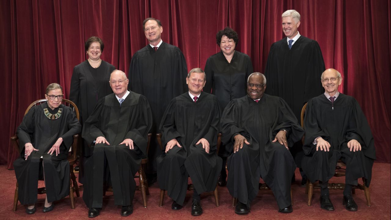 The justices of the US Supreme Court sit for an official photograph on June 1, 2017. In the front row, from left, are Ruth Bader Ginsburg, Anthony Kennedy, Chief Justice John Roberts, Clarence Thomas and Stephen Breyer. In the back row, from left, are Elena Kagan, Samuel Alito, Sonia Sotomayor and Neil Gorsuch.