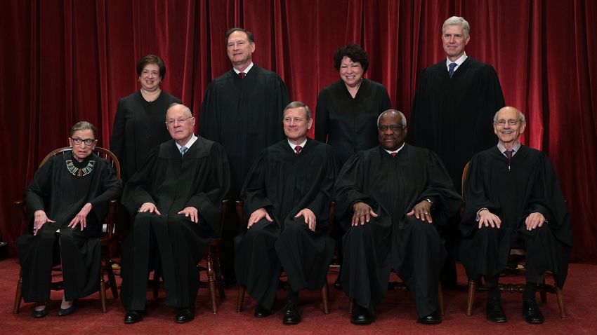Front row from left, U.S. Supreme Court Associate Justice Ruth Bader Ginsburg, Associate Justice Anthony M. Kennedy, Chief Justice John G. Roberts, Associate Justice Clarence Thomas, and Associate Justice Stephen Breyer, back row from left, Associate Justice Elena Kagan, Associate Justice Samuel Alito Jr., Associate Justice Sonia Sotomayor, and Associate Justice Neil Gorsuch pose for a group portrait in the East Conference Room of the Supreme Court June 1, 2017 in Washington, DC.