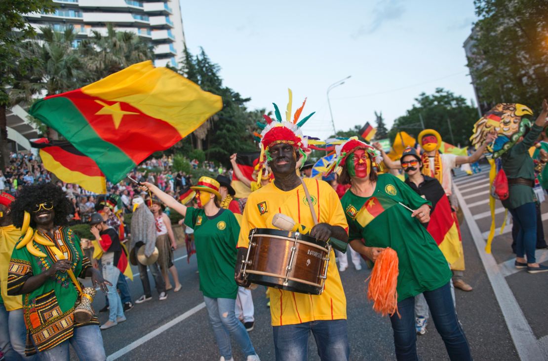 Fans wore black face paint and carried bananas in a parade in Sochi, Russia, before the Confederations Cup in 2017.