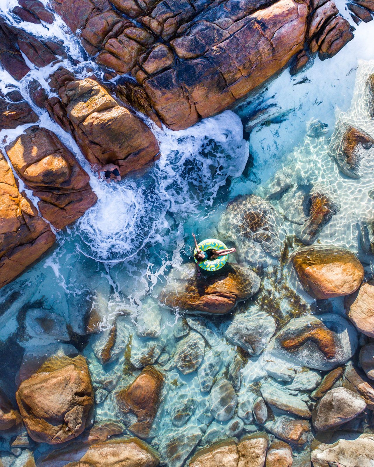 <strong>Wyadup Spa, Western Australia:</strong> The grand prize winner of the "Australia From Above" competition, this photograph by <a href="https://www.skypixel.com/user/contact-72b71c90-9f6f-44e6-b07f-eaf800c749a0" target="_blank" target="_blank">Kyle Bowman</a> was taken in Western Australia's Margaret River region. "Love the playful nature of this photo," said judges. "The intense contrast of the reds and greens give this image a vivid vibrancy. And it's not just an abstract photo; the person is the focal point and it cleverly shows a person interacting with the Australian environment." 