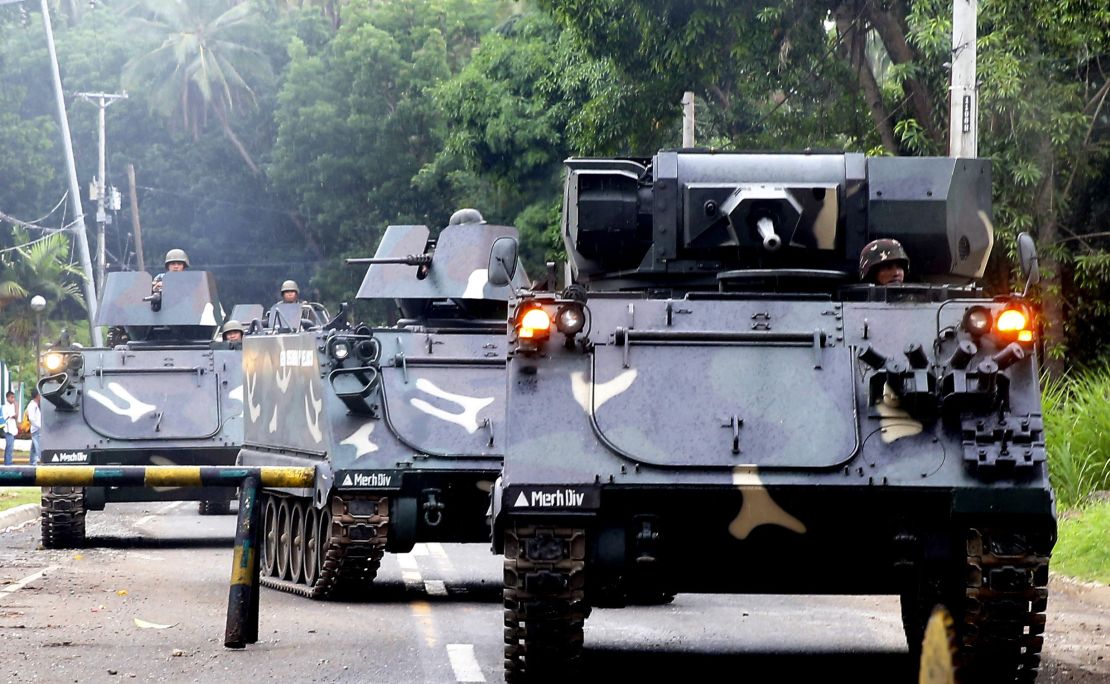 Philippines government armored vehicles enter Marawi on May 31.