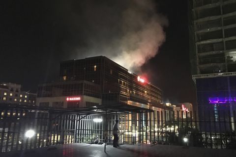 Smoke rises from the resort complex, which has an array of hotels, restaurants and bars.