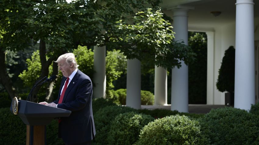 US President Donald Trump announces speaks at a press conference in the Rose Garden of the White House in Washington, DC, on June 1, 2017.
