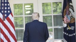 US President Donald Trump departs after he announced his decision to withdraw the US from the Paris Climate Accords in the Rose Garden of the White House in Washington, DC, on June 1, 2017.     
"As of today, the United States will cease all implementation of the non-binding Paris accord and the draconian financial and economic burdens the agreement imposes on our country," Trump said. / AFP PHOTO / SAUL LOEB        (Photo credit should read SAUL LOEB/AFP/Getty Images)