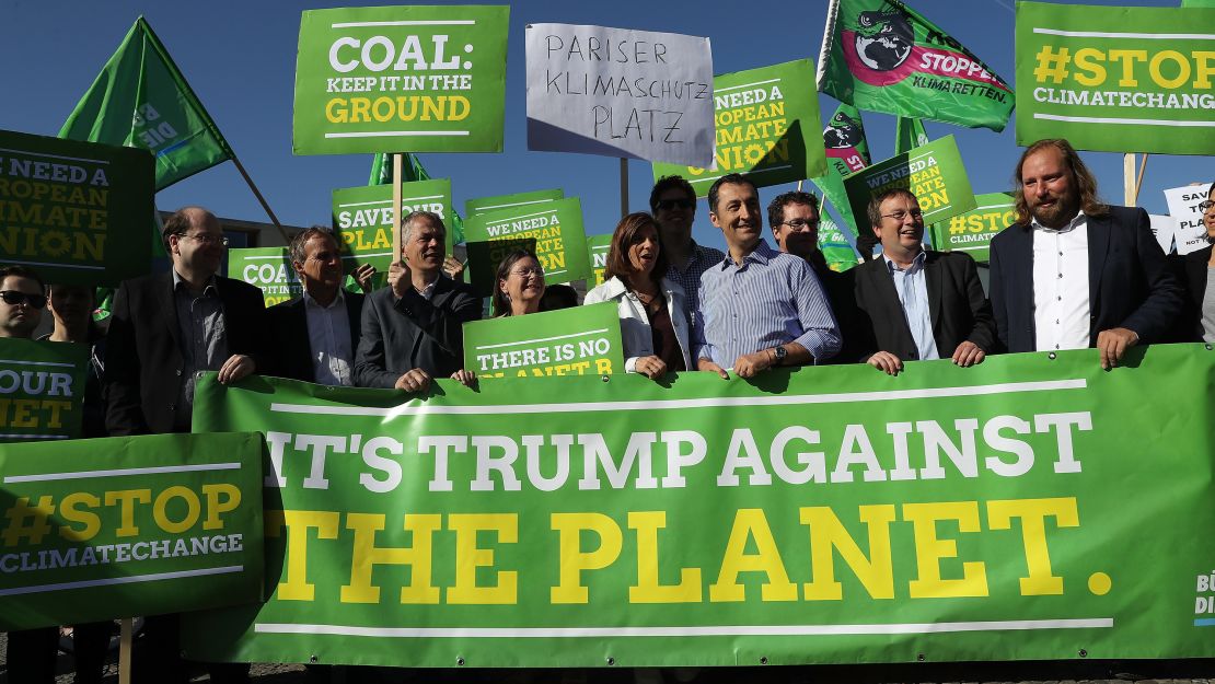 Protests erupted over President Trump's decision to pull the world's second biggest emitter of greenhouse gases out of the Paris Agreement.