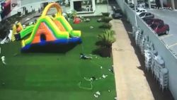 Wind sends inflatable bounce house flying ORIG TC_00002705.jpg