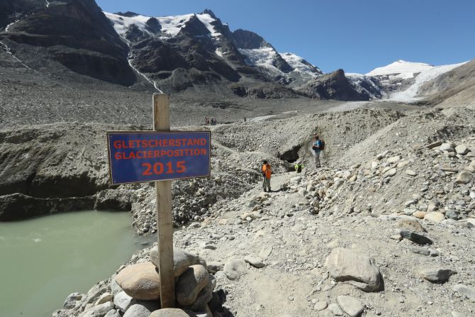 The Pasterze glacier is Austria's largest and it's shrinking rapidly: the sign on the trail indicates where the foot of the glacier reached in 2015, a year before this photo was taken. The European Environmental Agency <a href="index.php?page=&url=https%3A%2F%2Fwww.eea.europa.eu%2Fdata-and-maps%2Findicators%2Fglaciers-2%2Fassessment" target="_blank" target="_blank">predicts</a> the volume of European glaciers will decline by between 22 percent and 89 percent by 2100, depending on the future intensity of greenhouse gases. 