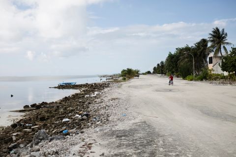 Low tide reveals the extent of accelerated erosion shown by the amount of exposed beach rocks on Maafushi beach in the Maldives. This is the world's lowest-lying country, with no part lying more than six feet above sea level. The island nation's future is under threat from anticipated global sea level rise, with many of its islands already suffering from coastal erosion.