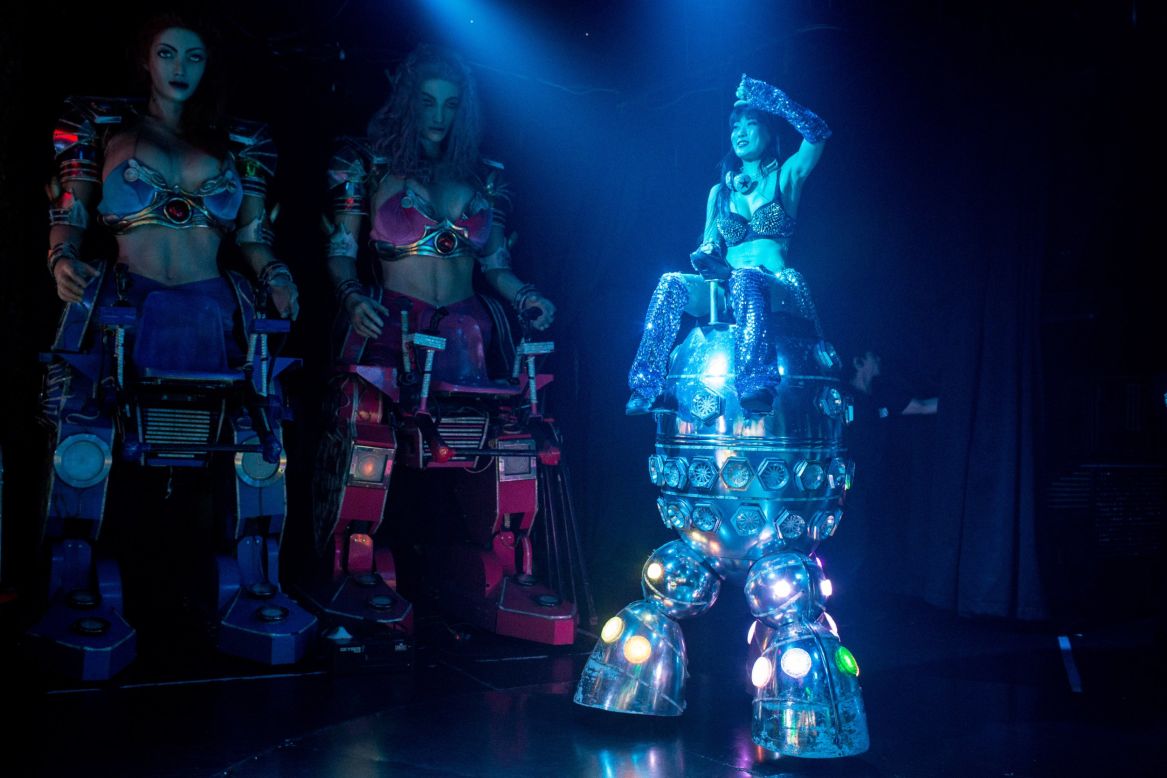 But the robots at Tokyo's famous "Robot Restaurant" aren't quite what they seem. Here, dancers in robot suits stage mock battles. Performances have included fembots with Thor hammers, dinosaurs battling robots and a giant neon tank.<br />