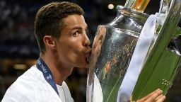 MILAN, ITALY - MAY 28:  Cristiano Ronaldo of Real Madrid   kisses the trophy after winning the UEFA Champions League Final match between Real Madrid and Club Atletico de Madrid at Stadio Giuseppe Meazza on May 28, 2016 in Milan, Italy.  (Photo by Matthias Hangst/Getty Images)