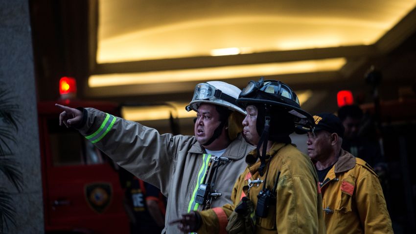 Firemen arrive at the Resorts World Hotel following an assault in Manila on June 2, 2017.
Thirty-four bodies were found in a casino complex after a gunman started a fire in the building, the local police chief said. / AFP PHOTO / NOEL CELIS        (Photo credit should read NOEL CELIS/AFP/Getty Images)