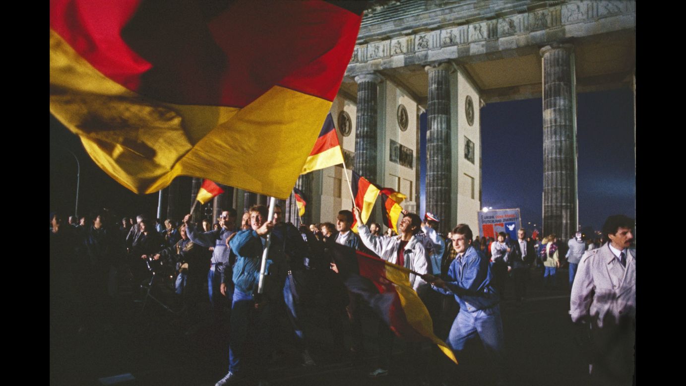 After decades of division after World War II, a treaty that brought together the German Democratic Republic and the Federal Republic to form a unified Germany was ratified on October 3, 1990. Here, Germans celebrate the news in front of Berlin's iconic Brandenburg Gate. 