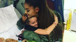 Pop star Ariana Grande visited a fan at the hospital who was injured in last month's terror attack at her Manchester concert.