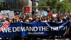 Demonstrators march as they take part in an anti-Trump "March for Truth" rally on June 3, 2017 in New York City. 