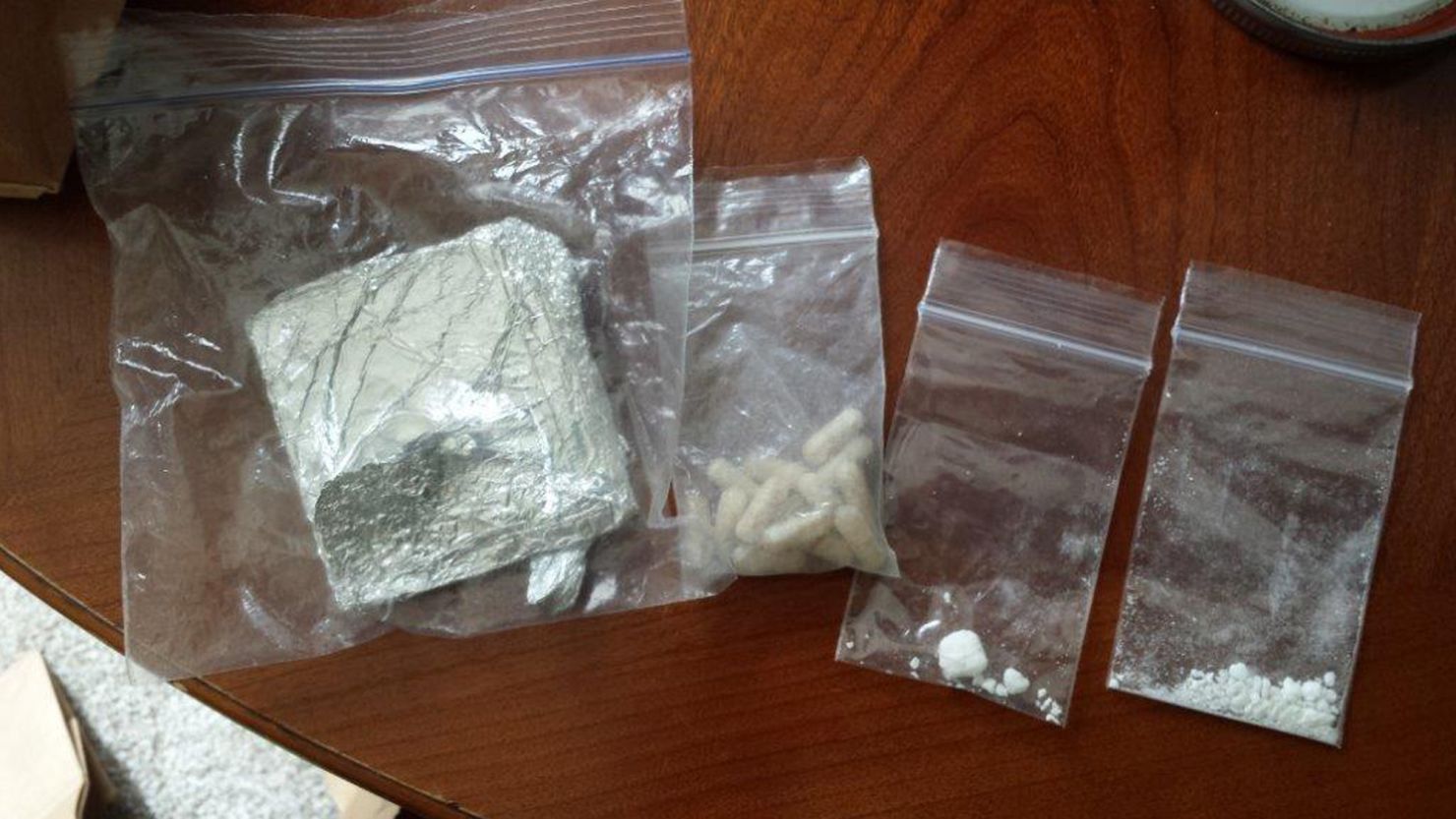 This image provided by the King County Sheriff's Office shows some of the drugs seized in the operation.