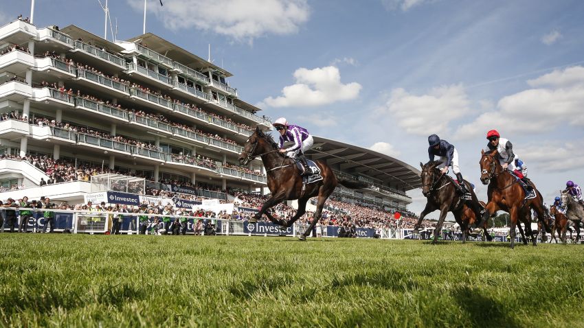 EPSOM, ENGLAND - JUNE 03:  Padraig Beggy riding Wings Of Eagles (L, pink cap) win The Investec Derby from Cliffs Of Moher (C, dark blue) on Investec Derby Day at Epsom Racecourse on June 3, 2017 in Epsom, England. (Photo by Alan Crowhurst/Getty Images)