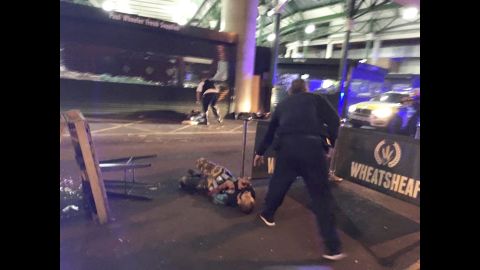 This image, from London's Borough Market, shows two of the attackers after they were shot by London police. The attackers drove a white van into pedestrians on London Bridge, leaving bodies lying in the roadway, a witness to the incident <a href="http://us.cnn.com/2017/06/03/europe/london-bridge-incident/index.html" target="_blank">told CNN</a>. 