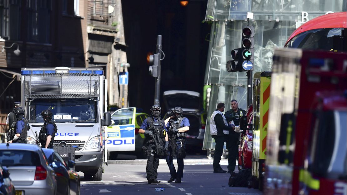 Armed police outside Borough Market, London, Sunday June 4, 2017, near the scene of Saturday night's terrorist incident.