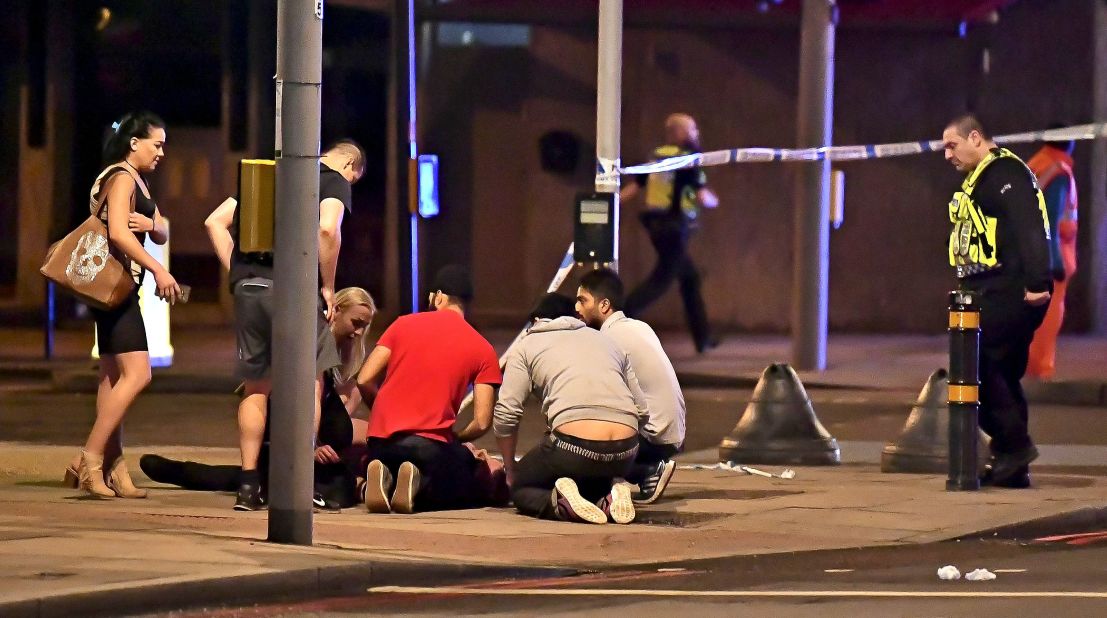 A person is treated for injuries near London Bridge.