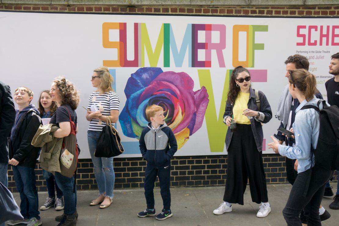 Visitors flood into a performance of Romeo and Juliet at the Globe Theater on London's South Bank.