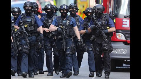 Counterterrorism officers patrol near the scene of the attack on London Bridge. When speaking to the media on Sunday, British Prime Minister Theresa May did not announce any increase in the UK terror threat level.