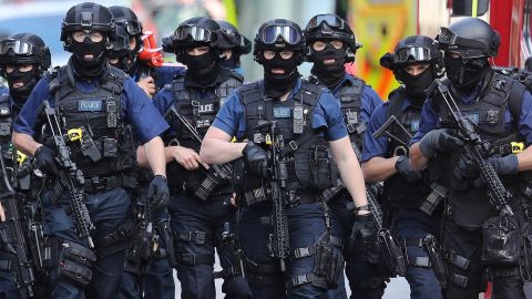 Counterterrorism officers on Sunday near the scene of the attack.