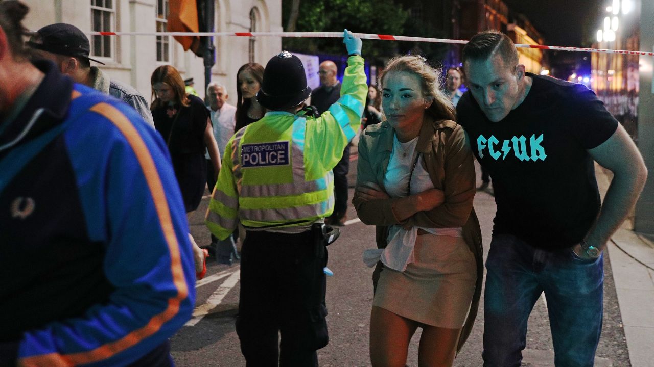 People are led away from the scene near London Bridge.