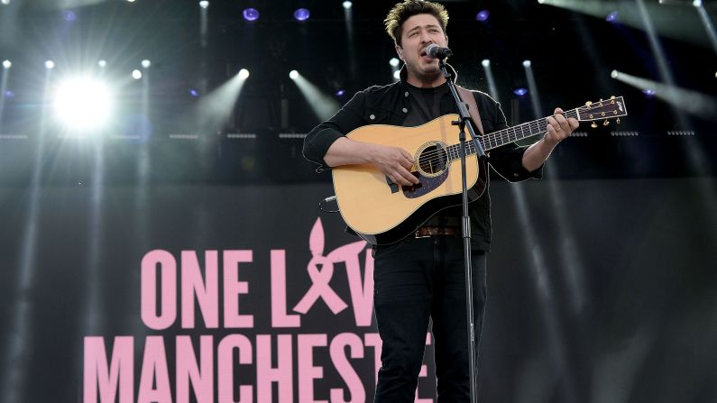 Marcus Mumford performs.