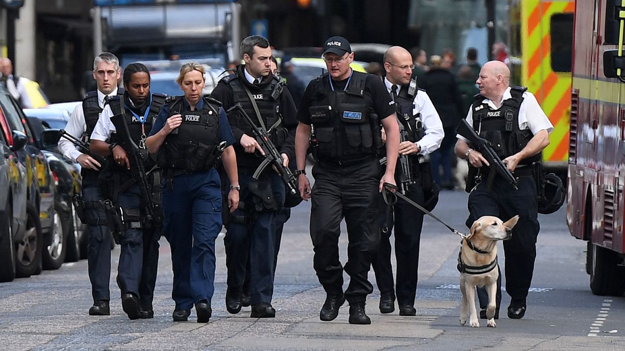 Police patrol the streets after the attack.