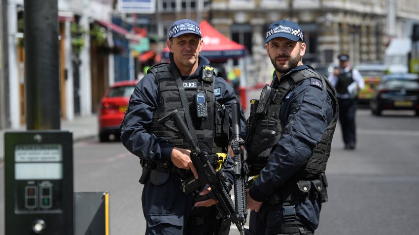 LONDON, ENGLAND - JUNE 04:  Armed police officers stand guard at the perimeter cordon, following last night's London terror attack, on June 4, 2017 in London, England. Prime Minister Theresa May has left the election campaign trail to hold a meeting of the emergency response committee, Cobra, this morning following a terror attack in central London on Saturday night. 7 people were killed and at least 48 injured in terror attacks on London Bridge and Borough Market. Three attackers were shot dead by armed police.  (Photo by Leon Neal/Getty Images)