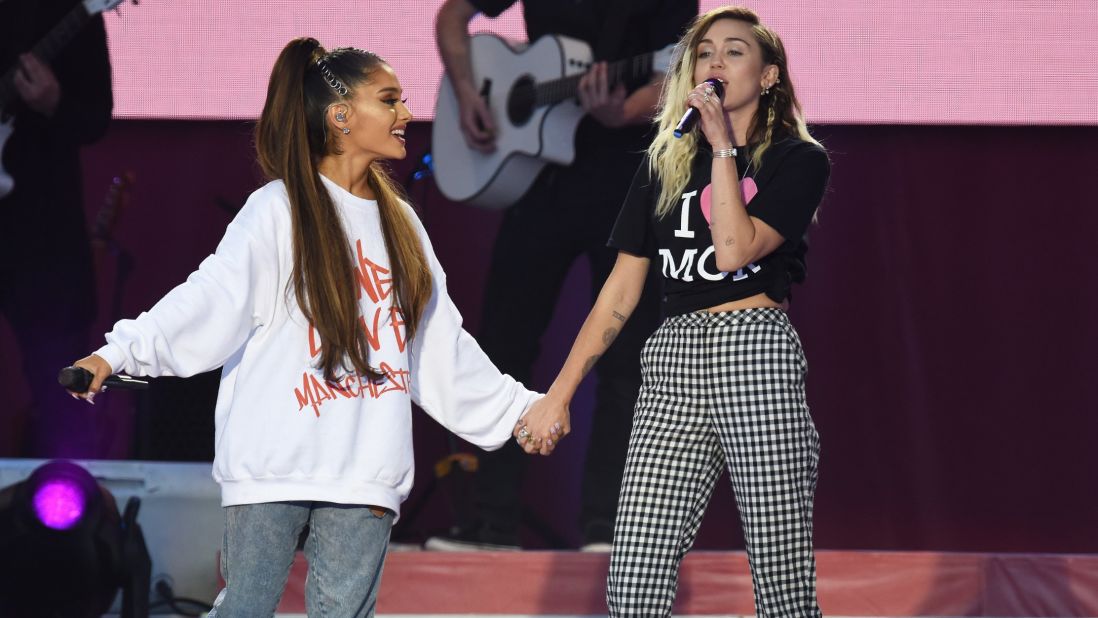 Ariana Grande and Miley Cyrus sing a duet. 