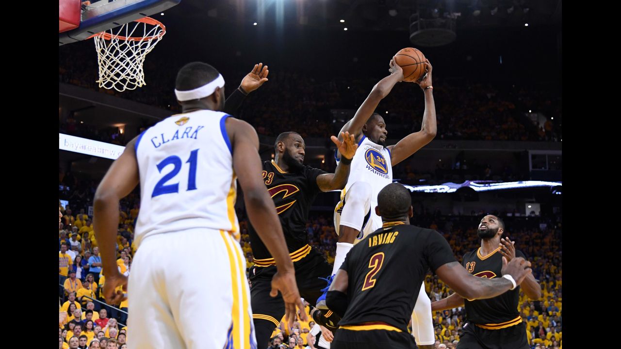 Durant rebounds the ball during Game 2, which Golden State won 132-113 on Sunday, June 4. Durant had a game-high 33 points to go with 13 rebounds, six assists and five blocks.
