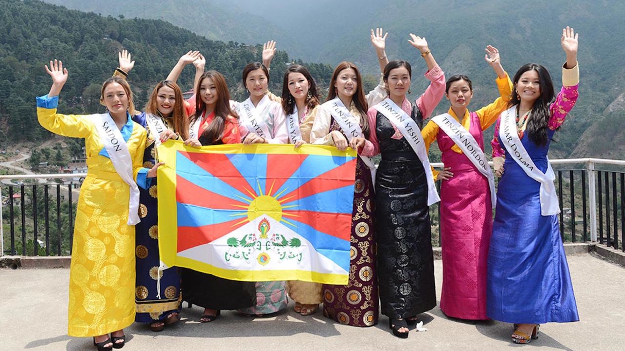 Nine contestants of the Miss Tibet Pageant 2017 pose for a photo during a press conference on 30 May 2017.