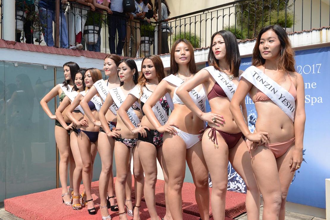 The nine contestants of the Miss Tibet Pageant 2017 pose for a photo during the Swimsuit Round at Asia Health Resorts in Dharamshala, India, on 2 June 2017.